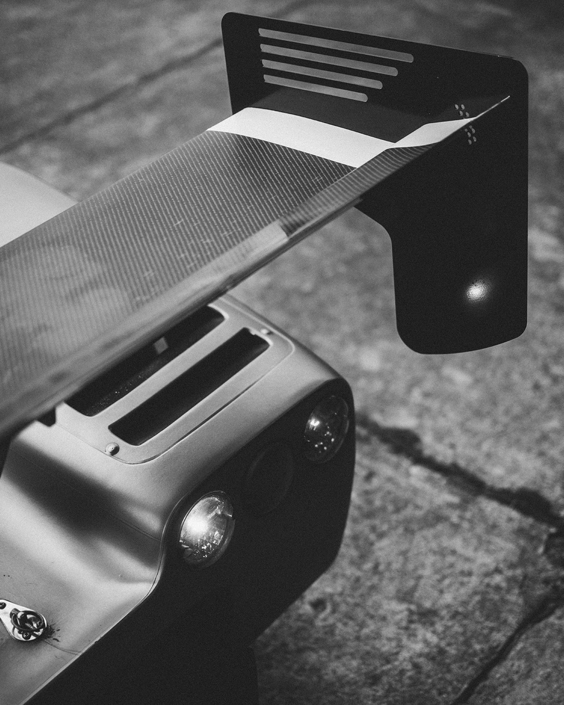 Radical race car rear wing detail in black and white